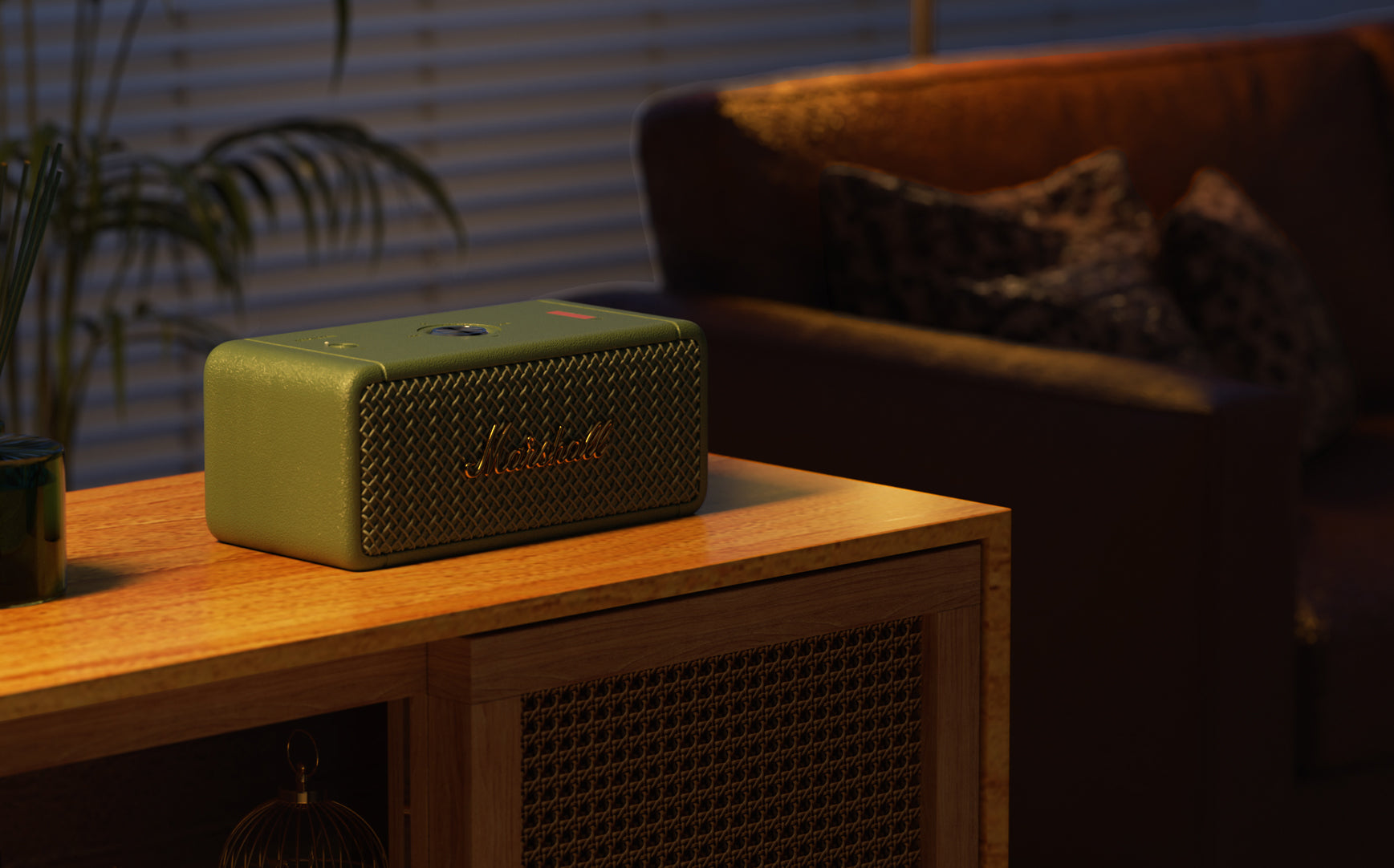 A compact speaker placed naturally in a warm living room